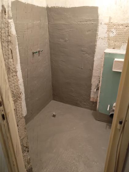 Floor and walls treated before tiling.